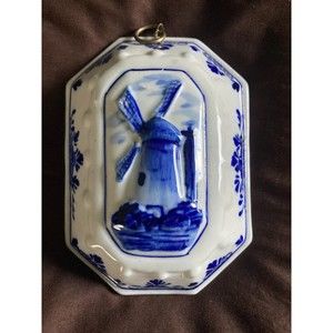 Vintage handcrafted Deft Blue windmill wall art